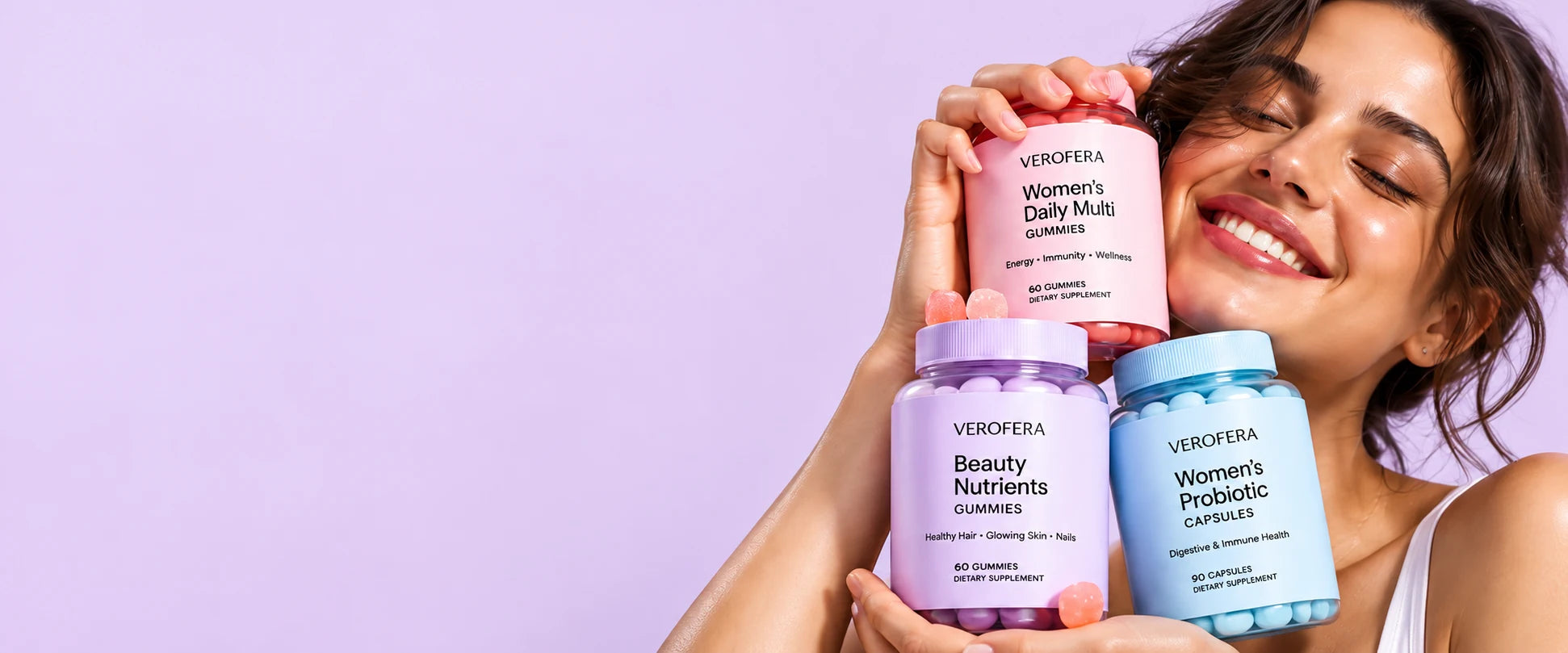 A woman with VEROFERA gummies and capsules